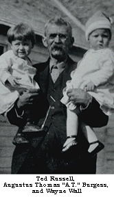 AT Burgess holding Ted Russell & Wayne Wall abt. 1916